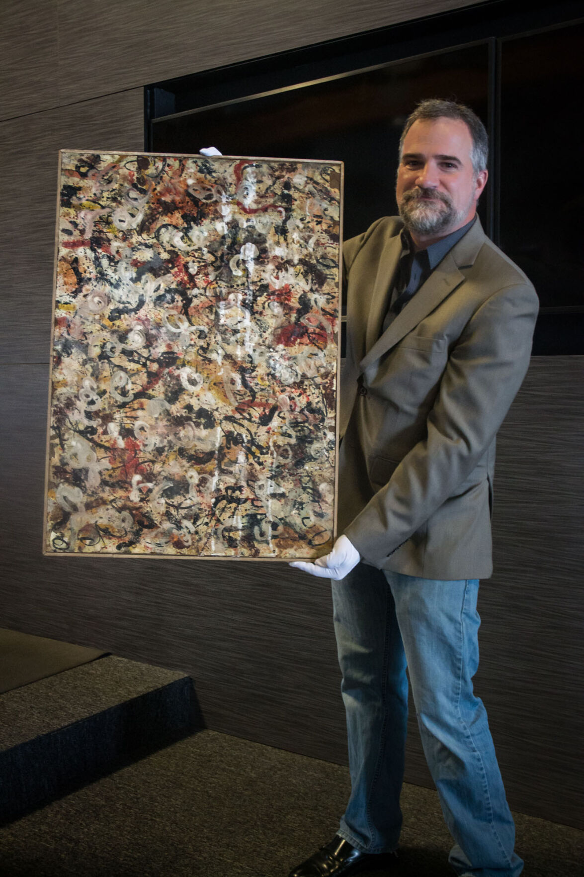 Josh Levine holds Jackson Pollock gouache painting – photo_Sami Gill